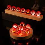 Glass Creative Luminous Figurines Transparent Red Crystal Ball Desktop Figurines Solid Wood Base Modern Cartoon Home Decoration